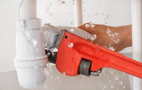 wrench on water pipe