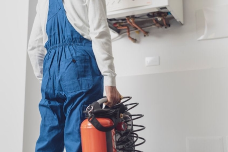 water heater being checked
